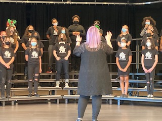 Rachael Directing a Middle School Choir