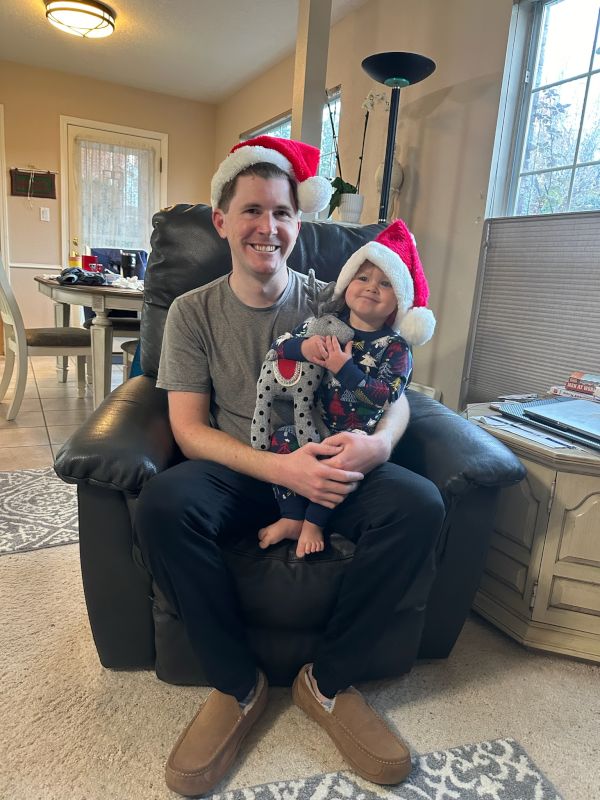 Eric Playing Santa With Our Niece