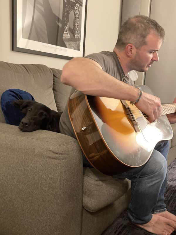 Drew Serenading Paws