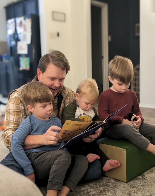 Justin Reading to His Nephews