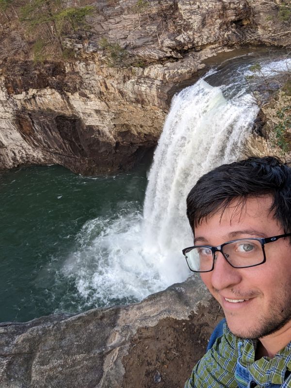Hiking by a Huge Waterfall