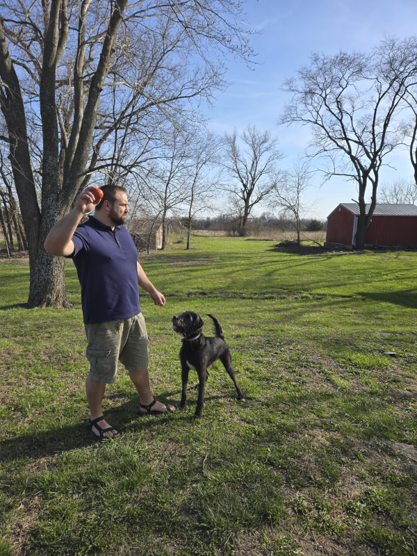 Nick Playing Fetch with Our Dog