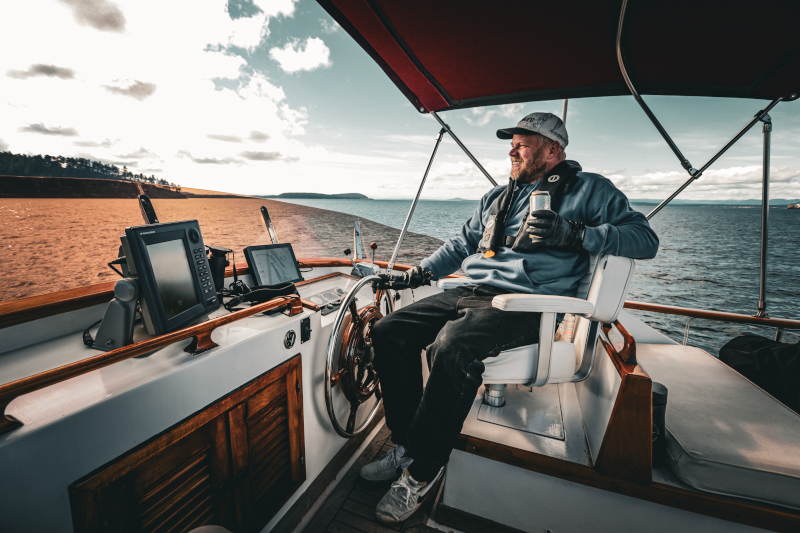 Adam Steering the Boat