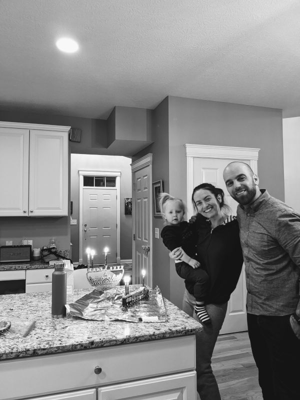Lighting The Menorah during Hannukah